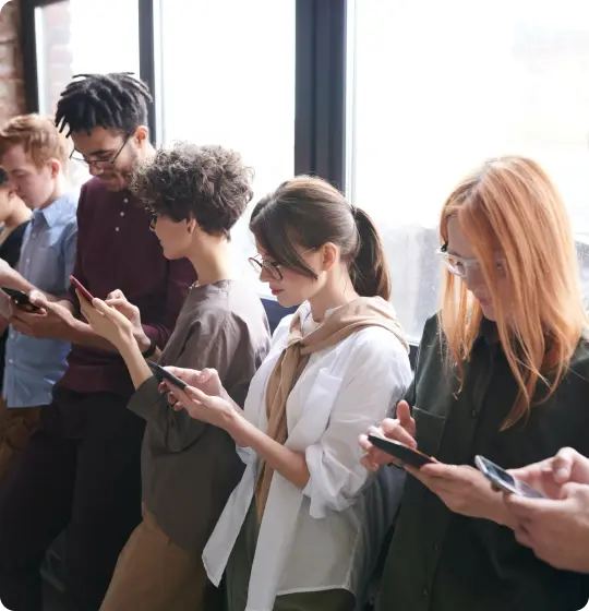 Team photo with phones